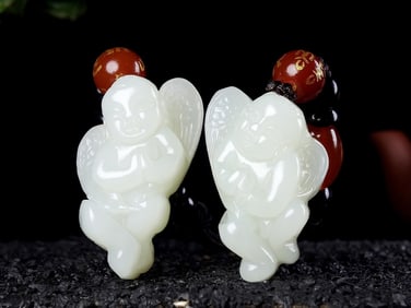 A Pair of Exquisite White Jade Angel Pendants