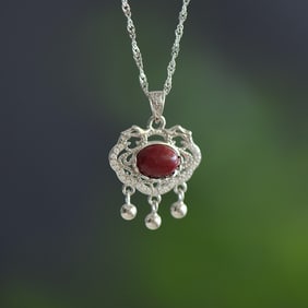 An Exquisite Sterling Silver Inlaid Cinnabar Pendant