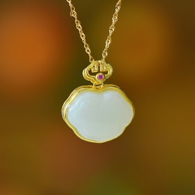 An Exquisite Sterling Silver-Gold Plated Inlaid White Jade Pendant