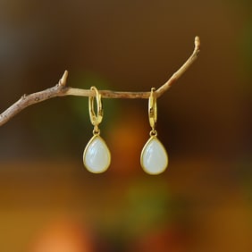 A Pair of Exquisite Sterling Silver-Gold Plated Inlaid White Jade Earrings