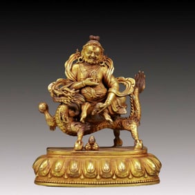 A Solemn Gilt Bronze Statue of Mammon