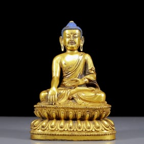 A Solemn Gilt Bronze Statue of Sakyamuni