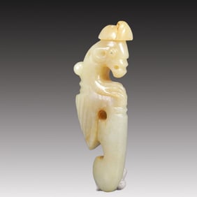 A Rare White Jade Auspicious Beast Ornament