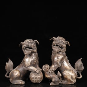 A Pair of Exquisite Silver Lion Ornaments