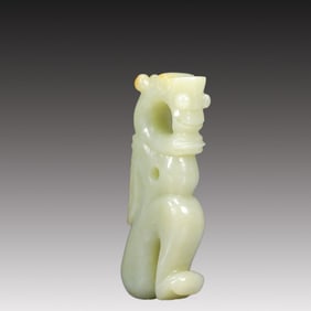 A Rare White Jade Auspicious Beast Ornament
