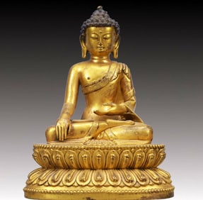 A Solemn Gilt Bronze Statue of Sakyamuni