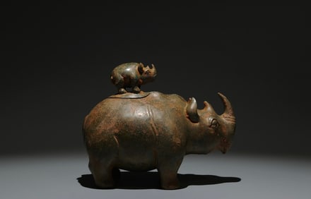 An Archaic Bronze Rhinoceros-Shaped Zun