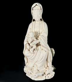 A Solemn Blance-De-Chine Statue of Avalokitesvara