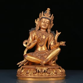 A solemn gilt bronze statue of Bodhisattva