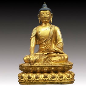A Solemn Gilt Bronze Statue of Sakyamuni