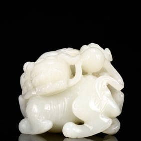An Exquisite White Jade Lion Ornament