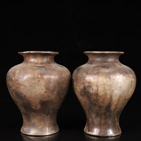 A Pair of Exquisite Silver Vases