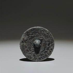 An Archaic Bronze Cloud Pattern Round Mirror