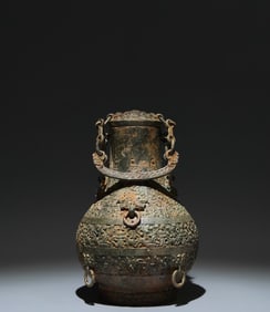 An Archaic Bronze Beast-Ears Ewer,With Inscription