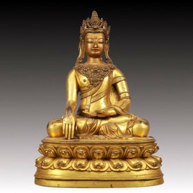 A Solemn Gilt Bronze Statue of Gautama’s Mother