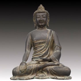 A Solemn Bronze Statue of Sakyamuni