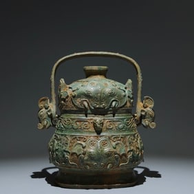 An Archaic Bronze Beast-Face Pattern Elephant-Ears Loop-handled Pot,with Inscription