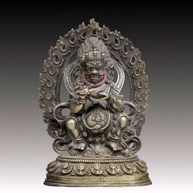 A Solemn Silver Statue of Mammon