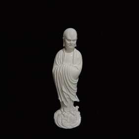 A Solemn Blance-De-Chine Statue of Dharma