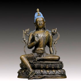 A Solemn Bronze Statue of Green Tara