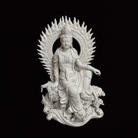 A Solemn Blance-De-Chine Statue of Avalokitesvara