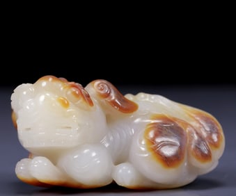 An Exquisite White Jade Auspicious Beast Ornament