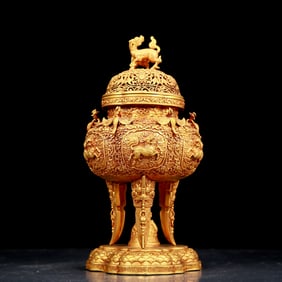 An exquisite gilt bronze tripod censer with floral and auspicious animal patterns