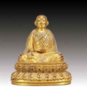 A Solemn Gilt Bronze Statue of Guru