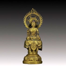 A Solemn Gilt Bronze Buddha
