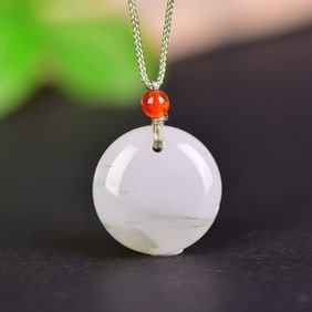 An Exquisite Jadeite Pendant