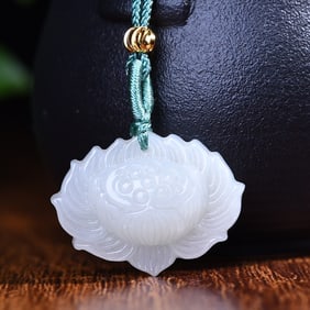 An Exquisite White Jade Lotus Pendant
