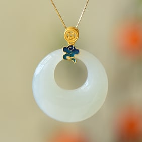 An Exquisite Sterling Silver-Gold Plated Inlaid White Jade Pendant
