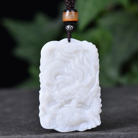 An Exquisite White Jade Dragon Pattern Pendant