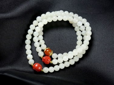 An Exquisite White Jade Bracelets