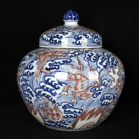 A Rare Blue and White Underglaze-Red Seawater and Auspicious Beast Pattern Cover Jars