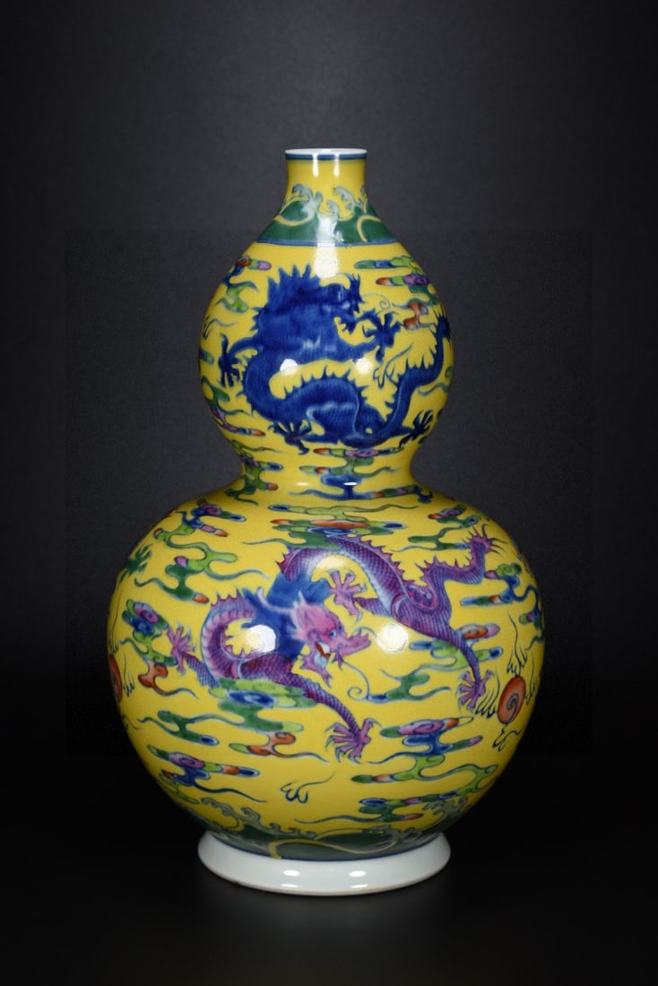 A Rare Yellow Glazed Doucai Auspicious Cloud and Dragon Pattern Gourd-Shaped Vase: A Rare Yellow Glazed Doucai Auspicious Cloud and Dragon Pattern Gourd-Shaped Vase,Qing Dynasty, China,Yongzheng Six-character Mark,Size:13.8inx8.7in 黄釉斗彩祥云