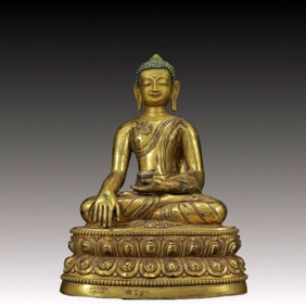 A Solemn Gilt Bronze Statue of Sakyamuni