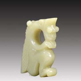 A Rare White Jade Auspicious Beast Ornament