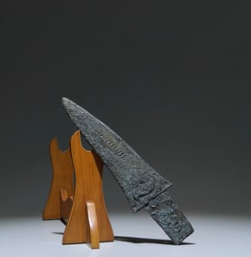 An Archaic Bronze Cloud and Thunder Pattern Weapon