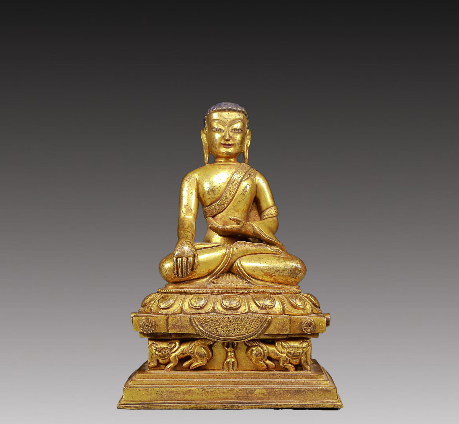 A Solemn Gilt Bronze Statue of Sakyamuni: A Solemn Gilt Bronze Statue of Sakyamuni,Ming Dynasty, China,Size:4.5inx3inx6.3in,Weight:1290g 铜鎏金释迦摩尼像，明代