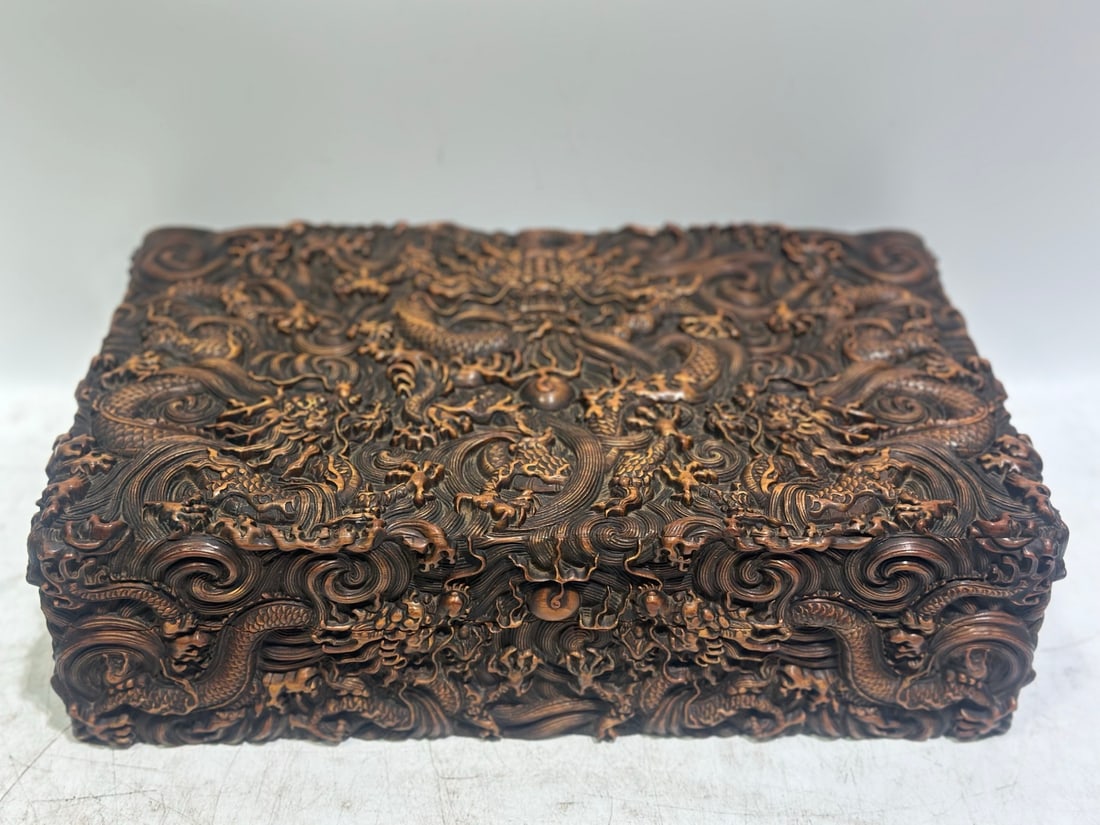 A Rare Huanghuali wood Auspicious Cloud and Dragon Pattern Box: A Rare Huanghuali wood Auspicious Cloud and Dragon Pattern Box,Qing Dynasty, China,Size:12.8inx8.1inx3.7in 黄花梨木祥云龙纹盒子,中