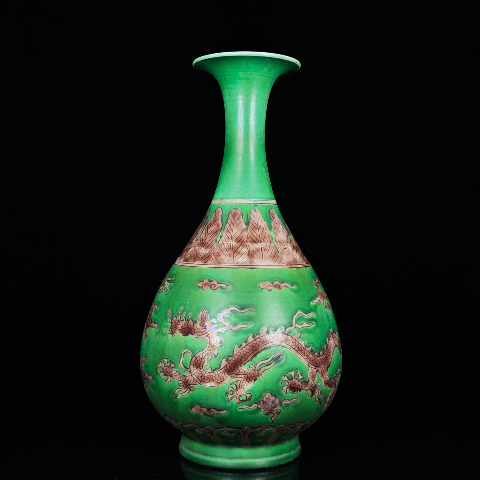 An Exquisite Biscuit Auspicious Cloud and Dragon Pattern Vase: An Exquisite Biscuit Auspicious Cloud and Dragon Pattern Vase,Ming Dynasty, China,Zhengde Four-character Mark,Size:10.6inx5.3in 素三彩祥云龙纹瓶,中