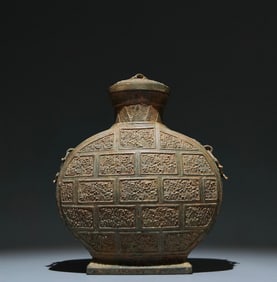 An Archaic Bronze Chi-Dragon Pattern Double-Ears Pot,With Inscription