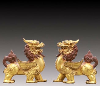 A Pair of Exquisite Gilt Bronze Lion Ornaments