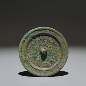 An Archaic Bronze Auspicious Beast Pattern Round Mirror