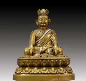 A Solemn Bronze Statue of Guru