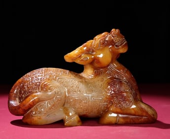 An Exquisite White Jade Buffalo Ornament