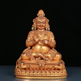 A solemn gilt bronze Vajra statue