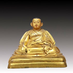 A Solemn Gilt Bronze Statue of Guru