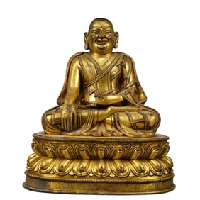 A Solemn Gilt Bronze Statue of Guru